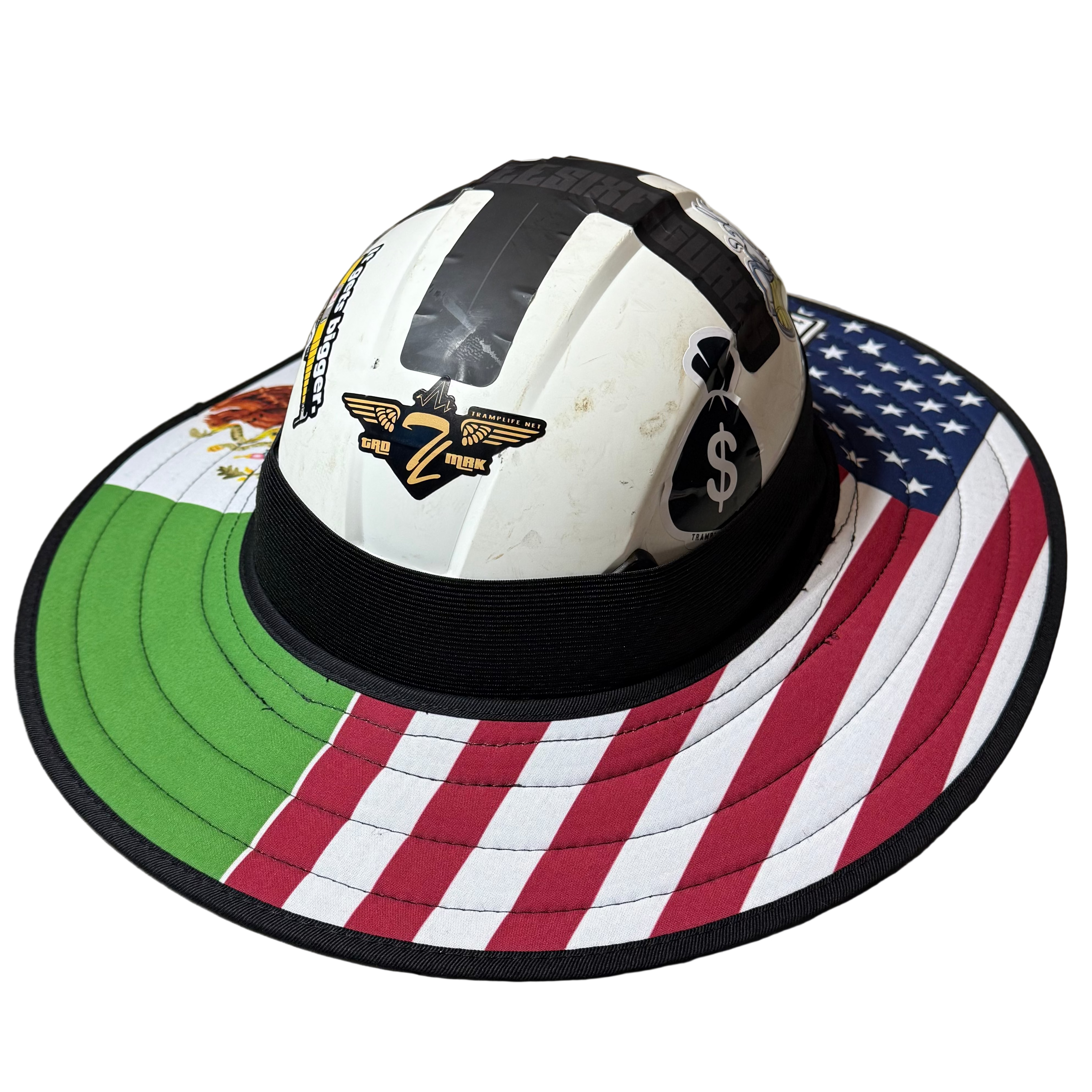 the americano fly shade from tramp life industries. it is a sunshade cover that goes over a hardhat to keep construction workers shaded. this design has half american flag and half mexican flag