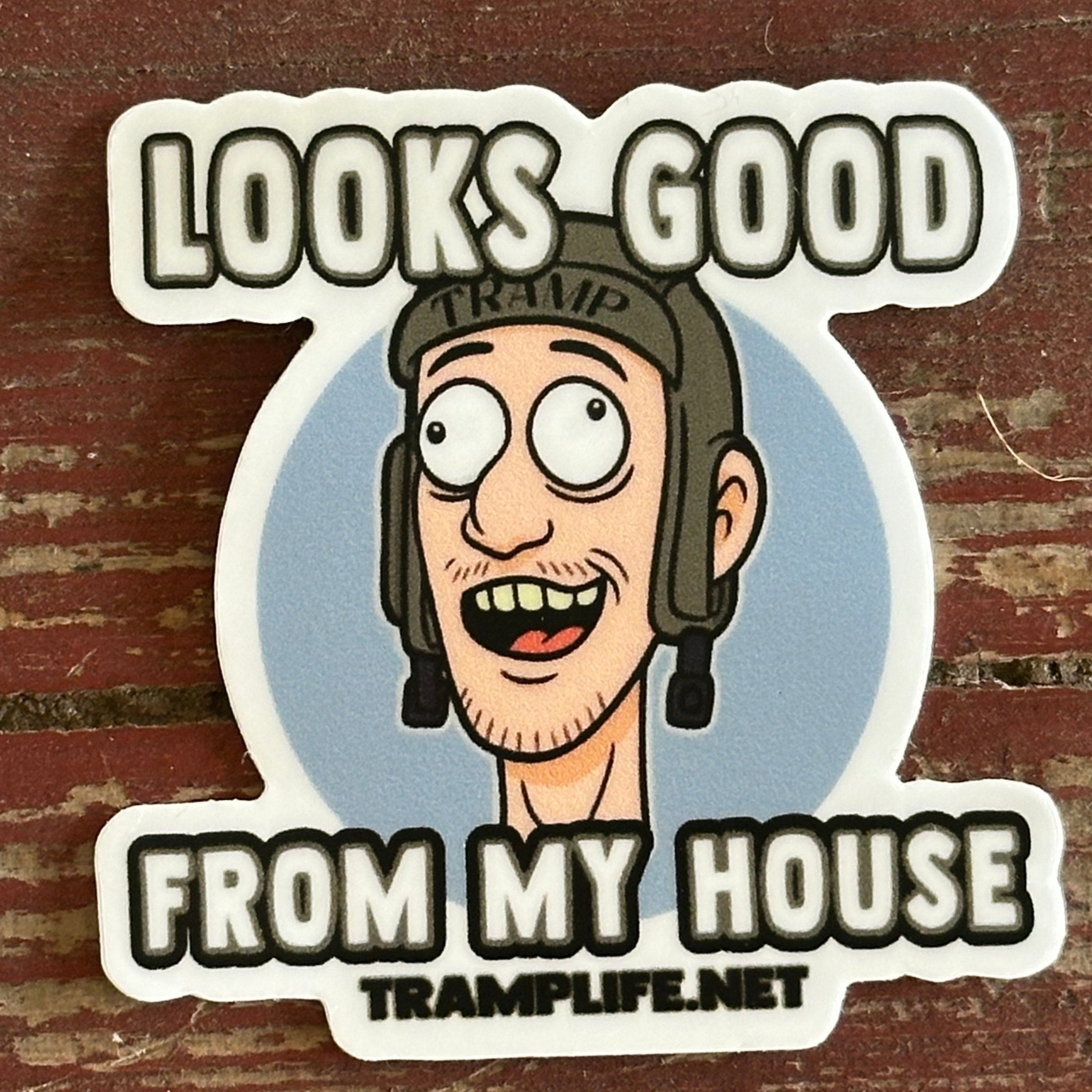 a sticker of a guys face that says looks good from my house