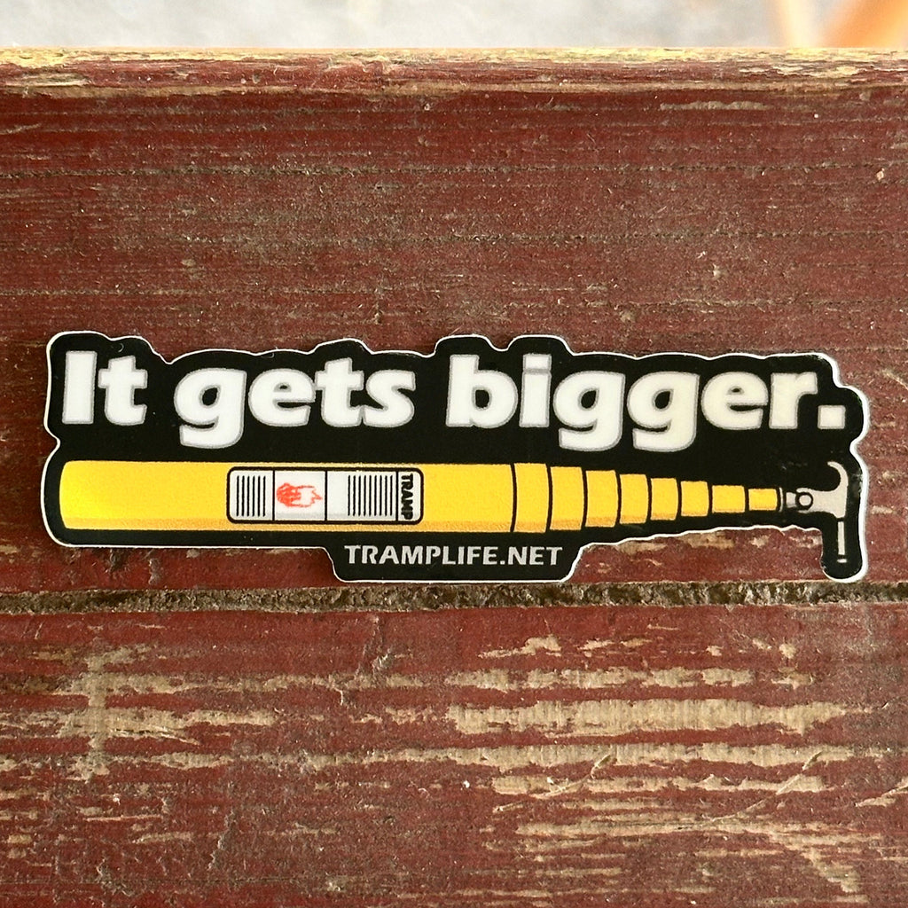 sticker with extendo stick that says it gets bigger