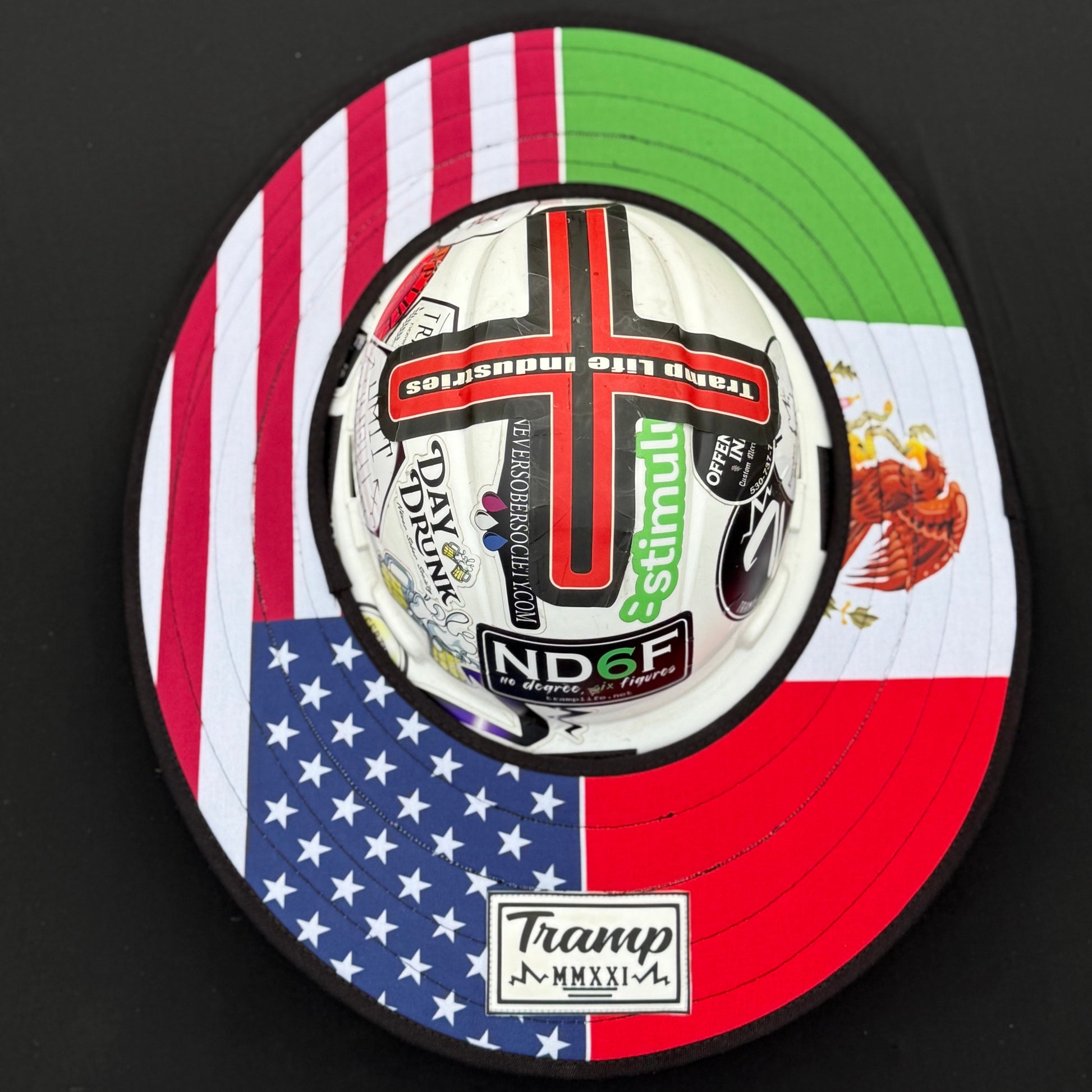 the americano sunshade from tramp life showing half american flag and half mexican flag