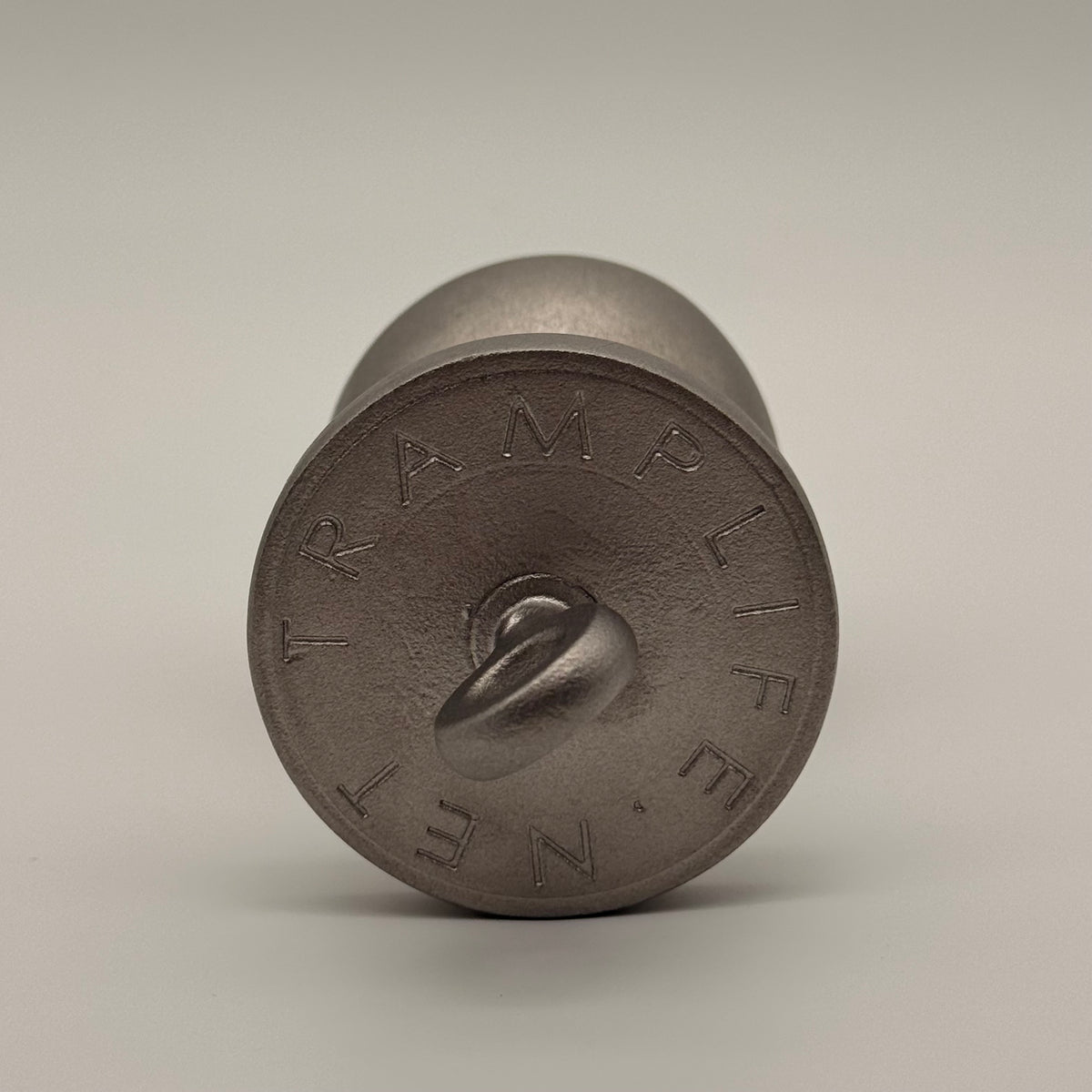 the plug plumb bob from tramp life industries. resembles a butt plug plumb bob. made from stainless steel 304. top view