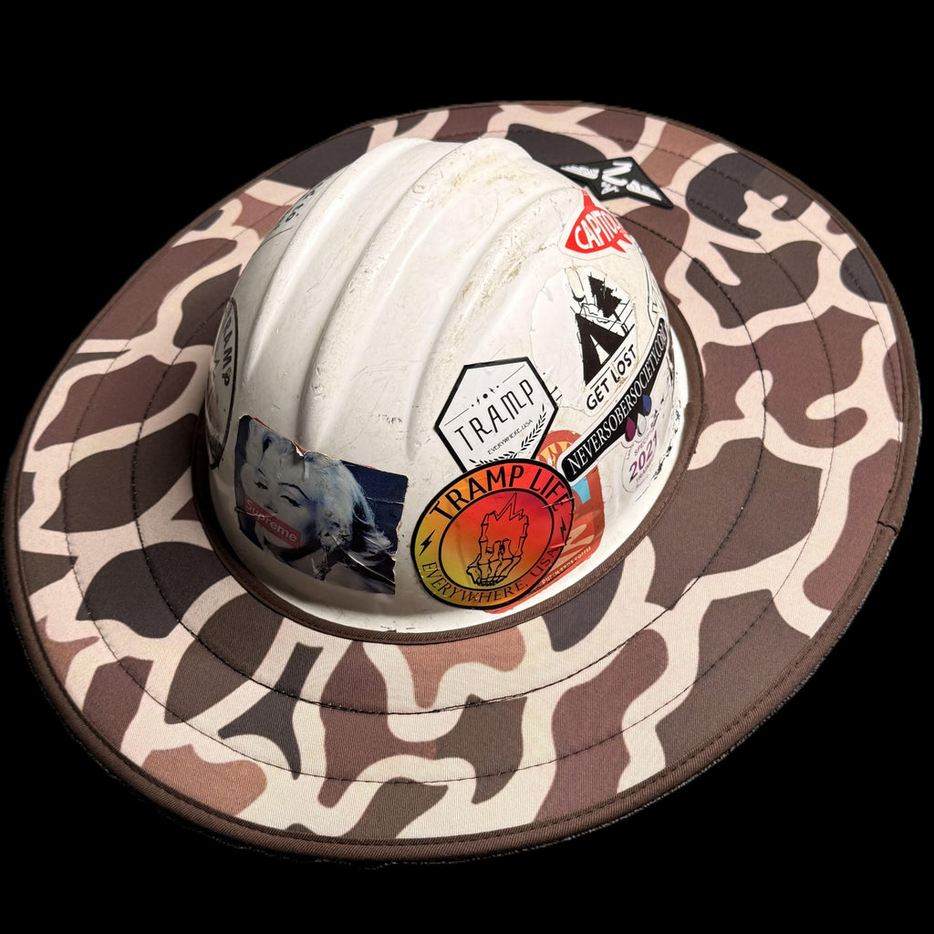 A duck camo hard hat sunshade from tramp life industries.