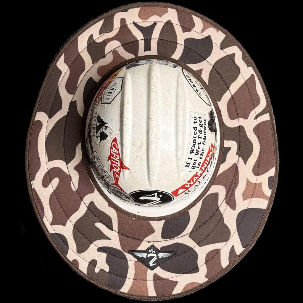 the duck camo hard hat sun shade from tramp life industries. goes around your hard hat for weather protection